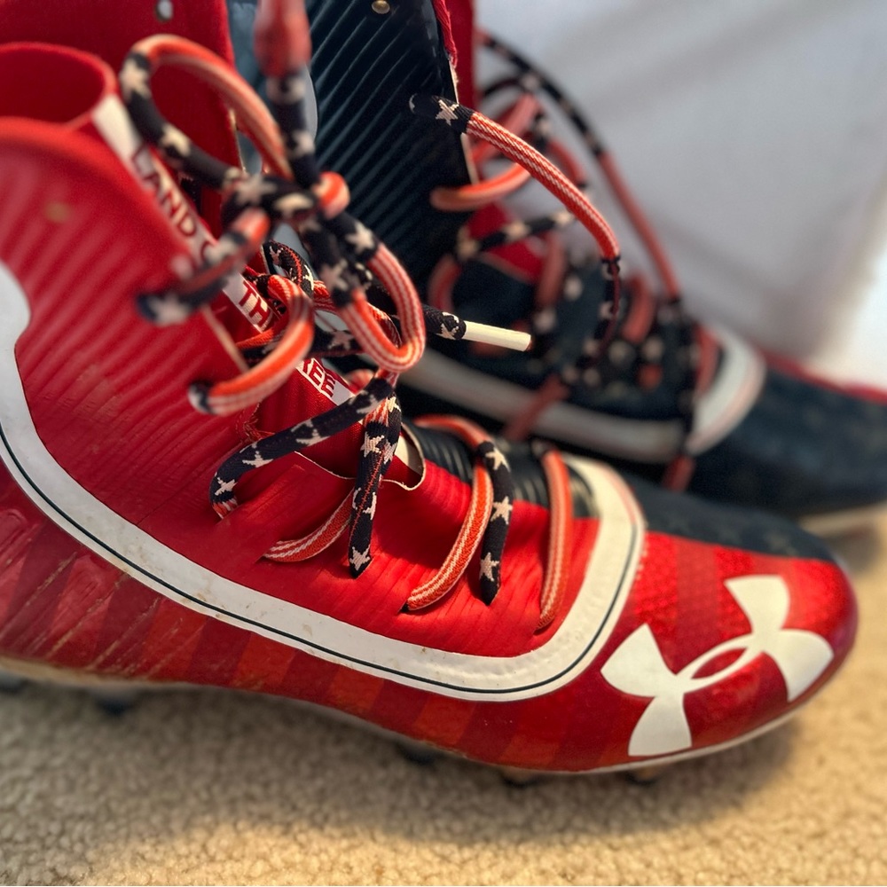 Size 8.5 Like new Under Armour Land of the Free high top cleats